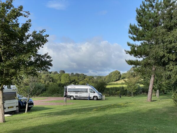 Picture of campervan in a bucolic setting